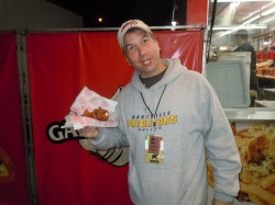 Tom enjoying a Chicken on a Stick from "The Best Around" Concessions